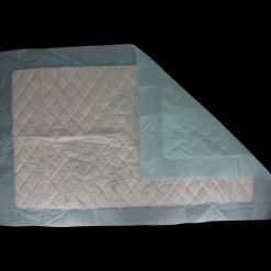 Blå underlag til seng og stol – engangsbeskyttelse ved inkontinens