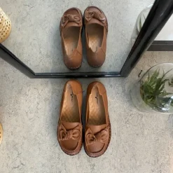 Elegant ballerina i brunt skind