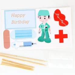 Sundhedspersonale kagepynt på pind